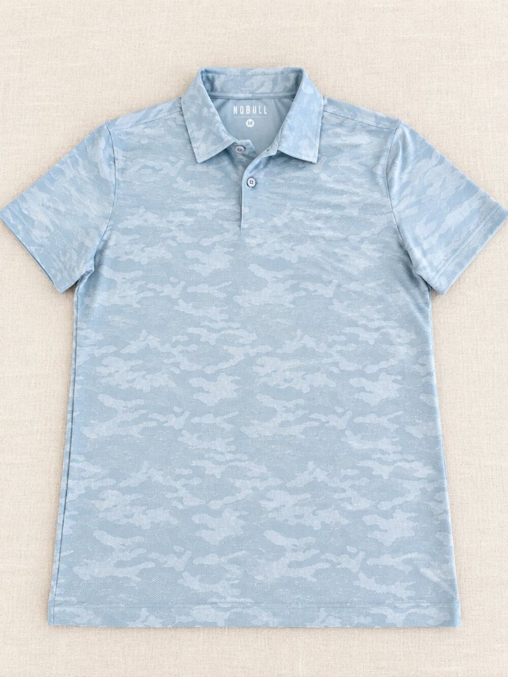 NOBULL Men’s Polo Size Medium Light Blue Camo Performance Golf Shirt